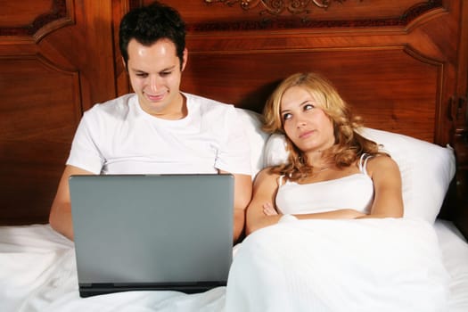 Young couple in bed