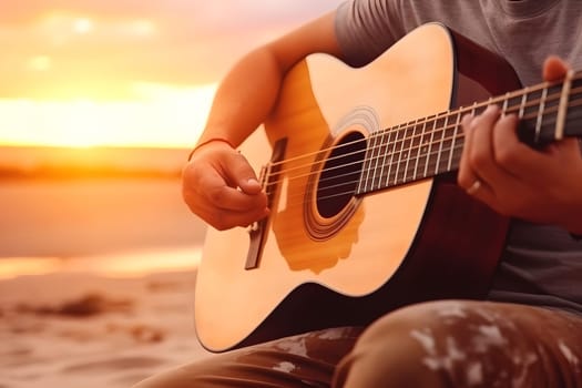 Caucasian man playing acoustic guitar on sandy beach at sunset time. Playing music concept. Neural network generated in May 2023. Not based on any actual person, scene or pattern.
