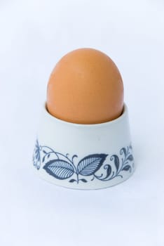 Boiled egg in egg holder