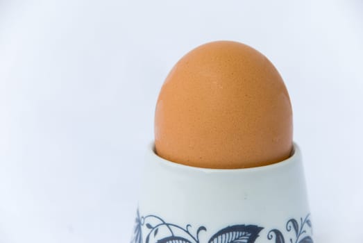 Boiled egg in egg holder