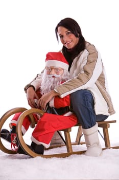 Woman with Santa Claus on sleigh