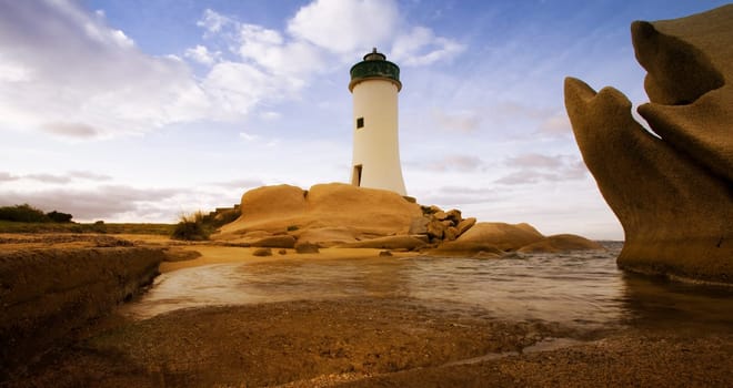 Lighthouse seen from a small street