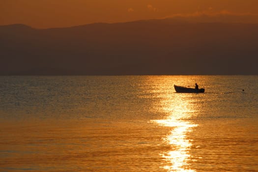 Sunrise with boat