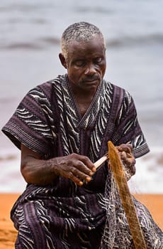 Again a picture of Herman the fisherman and net repairer,I find his concentration in his work particularly beautiful. It wasn't easy to get that,he wanted to pose in the usual way at first: No,I told him to be quiet