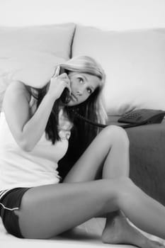 Young woman talking on the phone