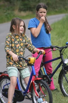 Girl with bicycle