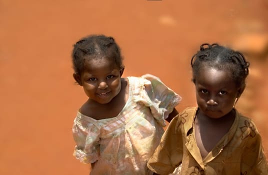 ... full in the sun I photographed the two adorable girls. They were published in b/w with a slight modification. See my series Kids and Co.
