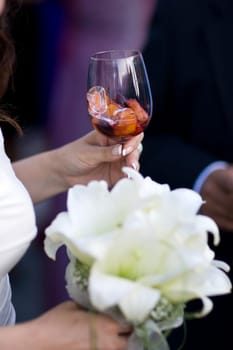 Bride holding glass