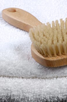 Sauna brush on towels