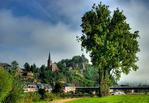 The 12 trees in the foreground are called the 12 apostles in Saarburg.