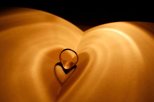 Ring forms a heart in the light