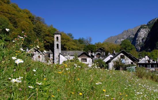 Foroglio,in the Bavona Valley,which has only been inhabited for half a year,with its houses and hamlets made of the same grey granite as the rock of the steep walls of the narrow valley.