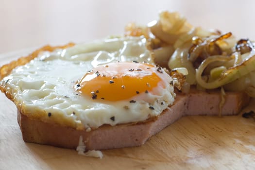 Meat loaf with roasted squirrels and fried egg