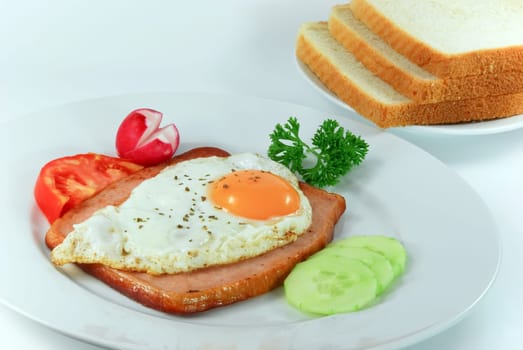 fried egg with mixed salad