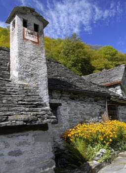 In a world of stone,wood and water,in an alpine valley bordered by vertical rocks without electricity,where new buildings are forbidden and inhabited only in the summer,this is Foroglio.