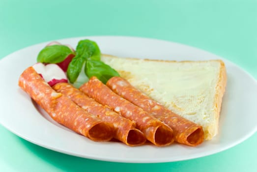 Breakfast with sausage ,toast,butter