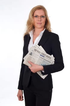 Young woman with stock market newspaper