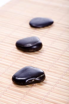 Three Zen Stones on Bamboo Mat II