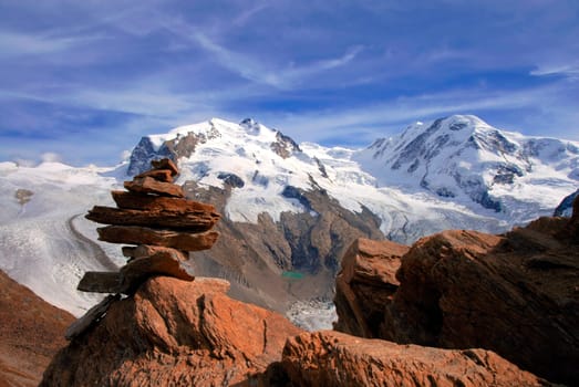 Monte Rosa is a mountain range in the Valais Alps,on the border between Switzerland and Italy. Its highest peak,the Dufourspitze,is the highest point in Switzerland and thus in the entire German-speaking world at 4,633.9 m above sea level.