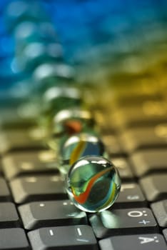 Marbles on keyboard