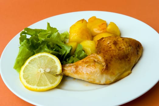 fried chicken leg with salad and
