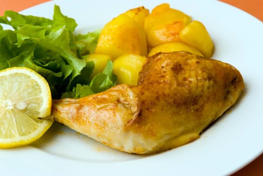fried chicken leg with salad and