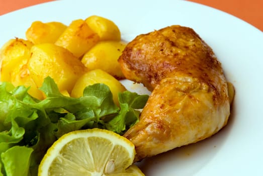 Fried chicken leg with salad