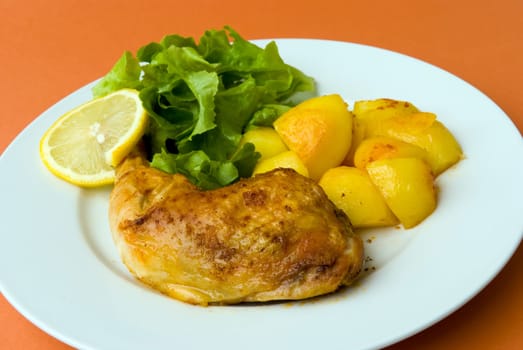 fried chicken leg with salad and