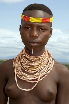 Portrait of a girl of the Karo tribe in southern Ethiopia.