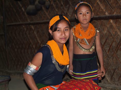... the two sisters,Kinie and Janti,live in Nagaland in northeast India. They belong to the tribe of the Konyak warriors of Longwah. On Sundays,they dress up and put on their pearl jewelry.
