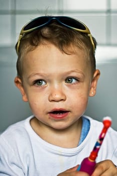 Child with toothbrush