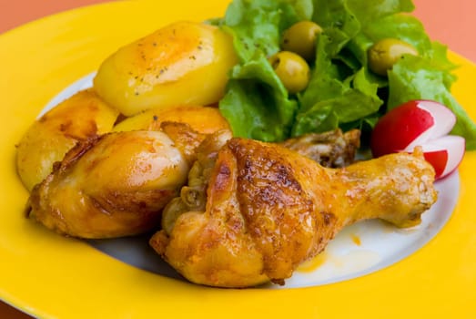 Chicken leg fried with salad