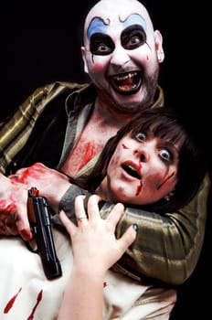 I got the idea from artist ROB ZOMBIE with his films "House of 1000 Corpses"" and ""THE DEVILS REJECTS""! We had a lot of fun during the shooting,as ALWAYS during my sessions -) There is really a lot of heart and soul in the photos,ha"