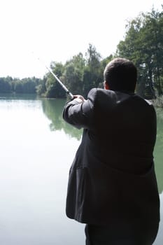 Businessman fishing