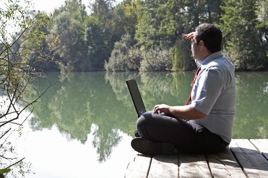 Businessman by the lake