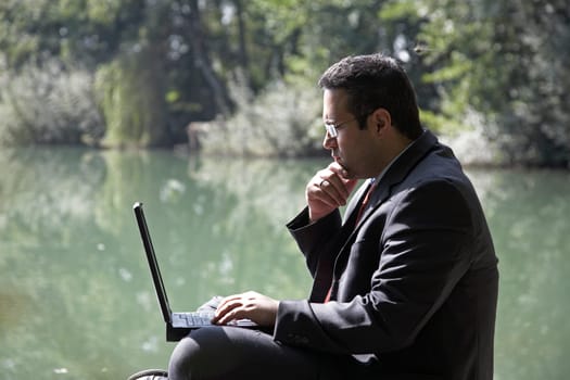 Businessman by the lake