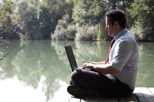 Businessman by the lake