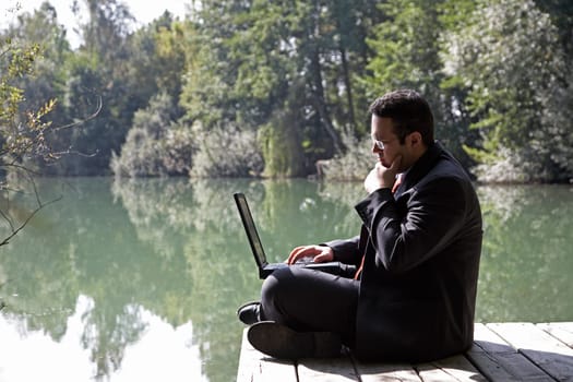 Businessman by the lake