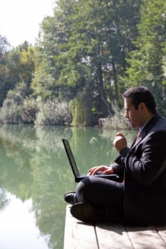 Businessman by the lake