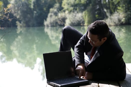 Businessman by the lake