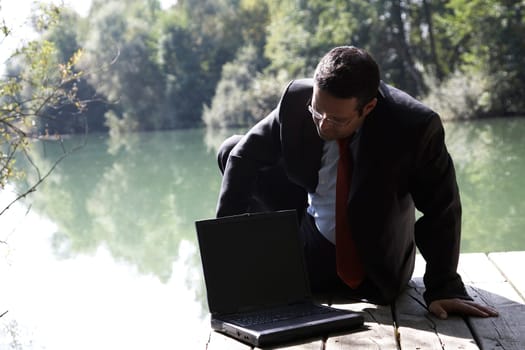 Businessman by the lake