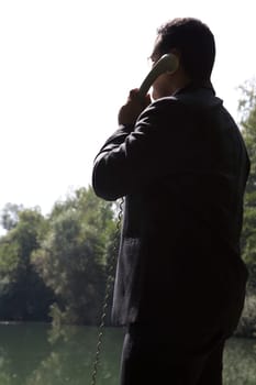 Businessman by the lake
