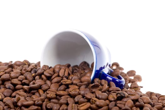 blue espresso cup with coffee beans
