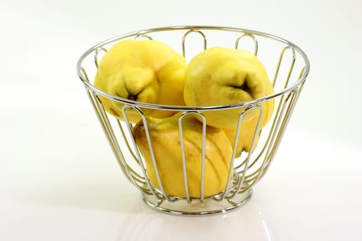 Quinces in a fruit basket