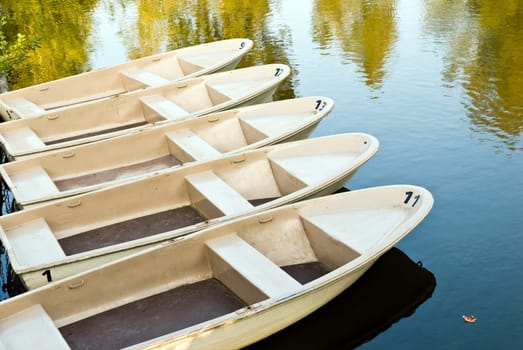 Boats in autumn on the lake