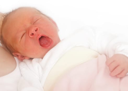 Yawning newborn baby