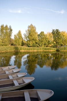 Boats in autumn on the lake