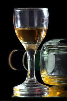 full glass and bottle