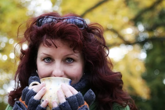 Drinking a tea in autumn