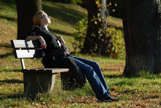 Golden autumn,woman enjoying evening sun